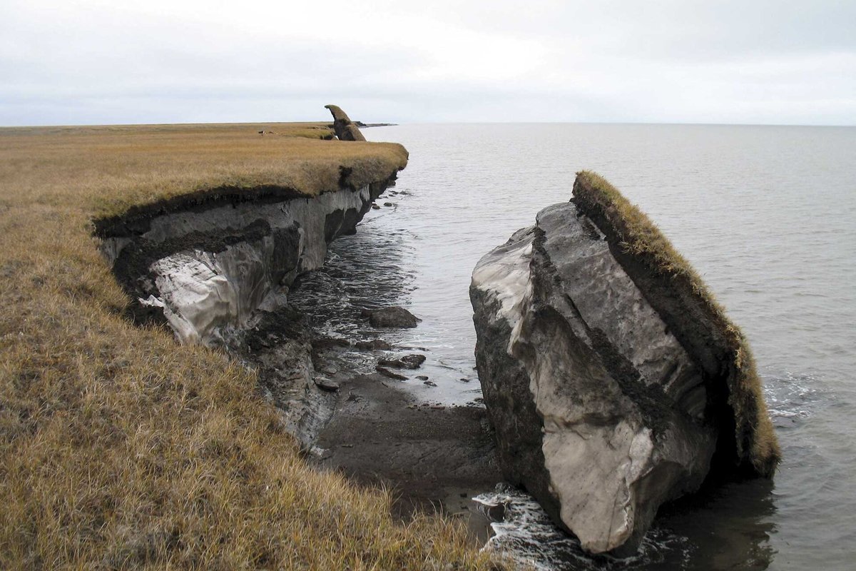 Thawing permafrost coastal bluffs slumping into the Arctic Ocean due to thermal erosion