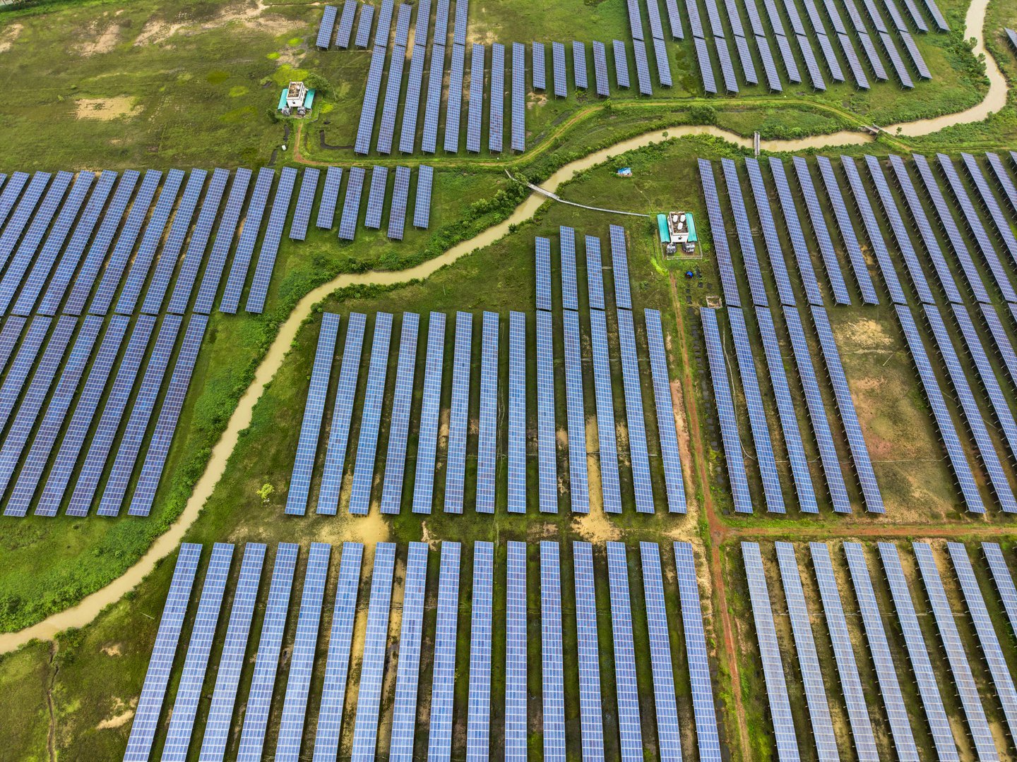 Photovoltaic solar panels deployed across utility-scale generating acreage to offset rising commercial energy consumption.