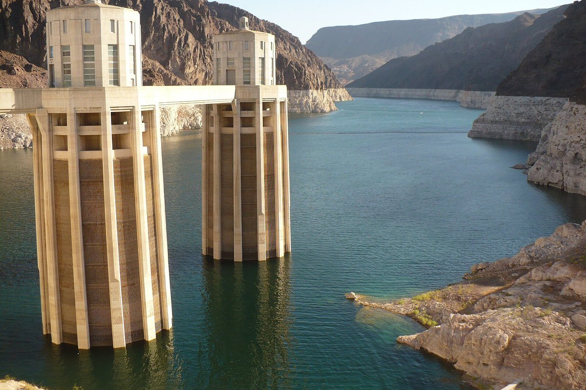 Agricultural irrigation canal in Colorado Grand Valley diverting river water for fruit orchards