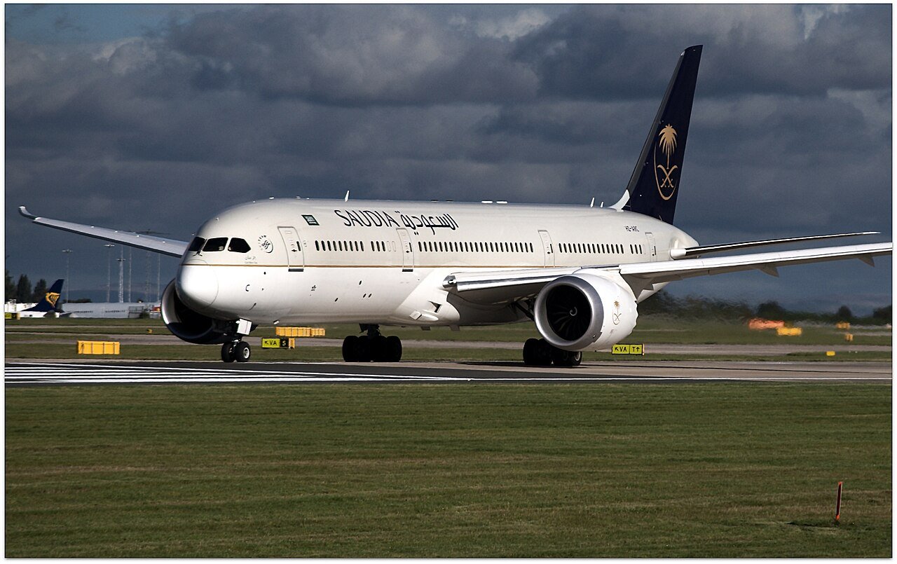 Commercial airliner taxiing on an airport runway apron prior to scheduled departure