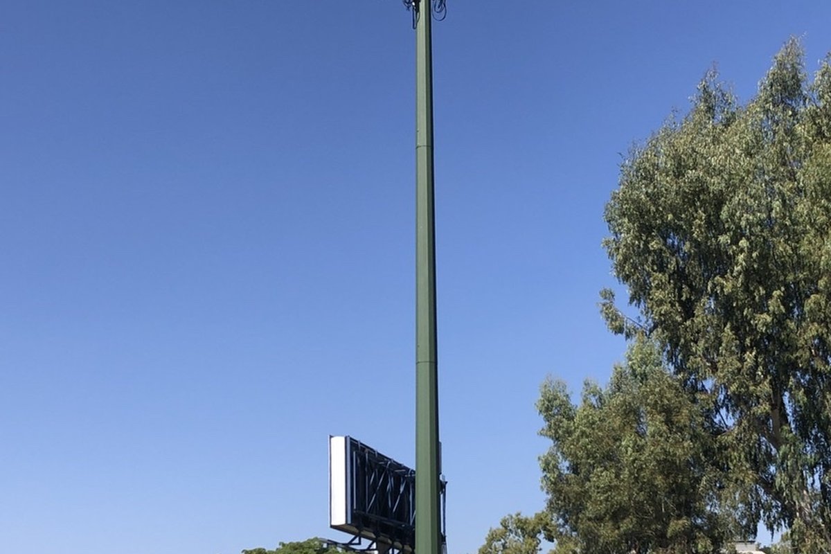 Cellular wireless transmission tower transmitting mobile broadband data signals