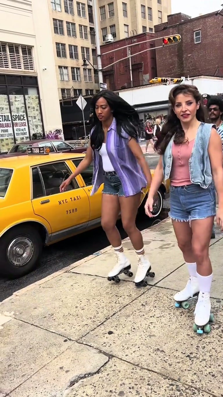 Illustrative photograph: 1984 New York Nostalgia: Roller Skates & Yellow Cabs