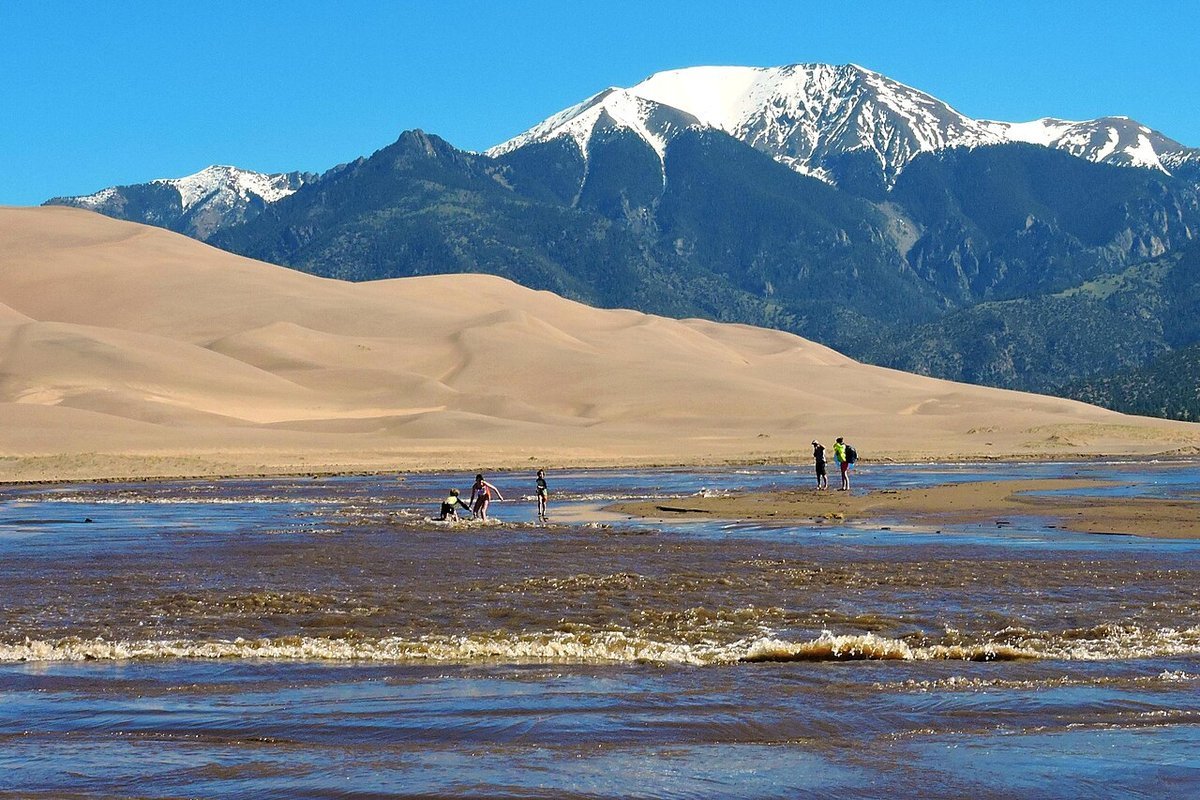Mountain stream runoff fed by melting winter snowpack in the Colorado Rocky Mountains
